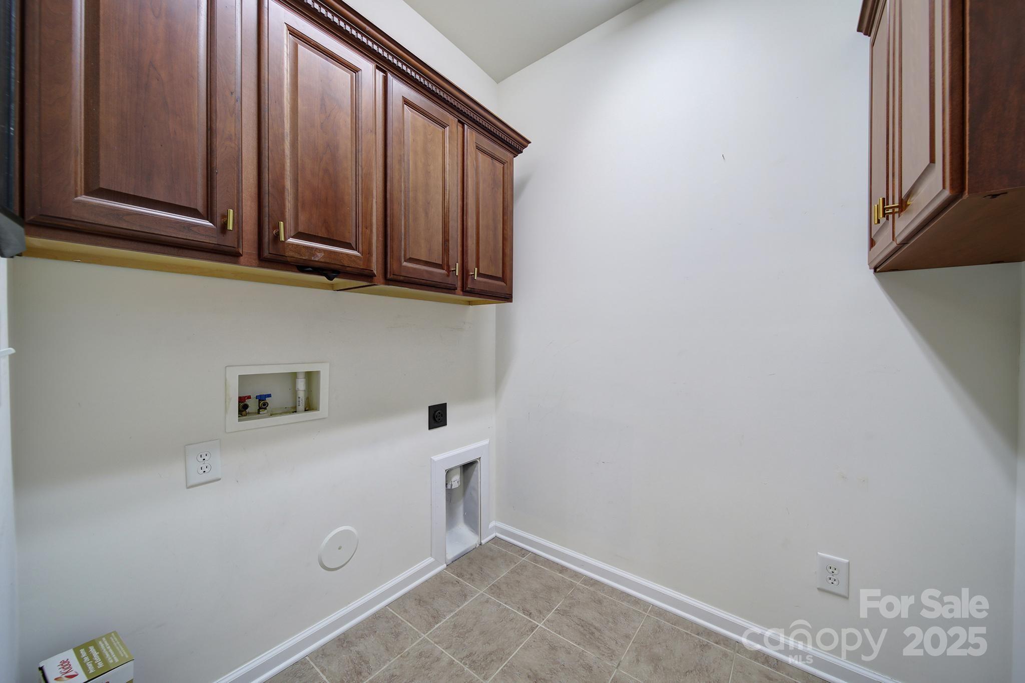 314 Wave Crest Drive Tega Cay, SC 29708 - Photo 21 of 39 a view of storage and utility room with washer and dryer