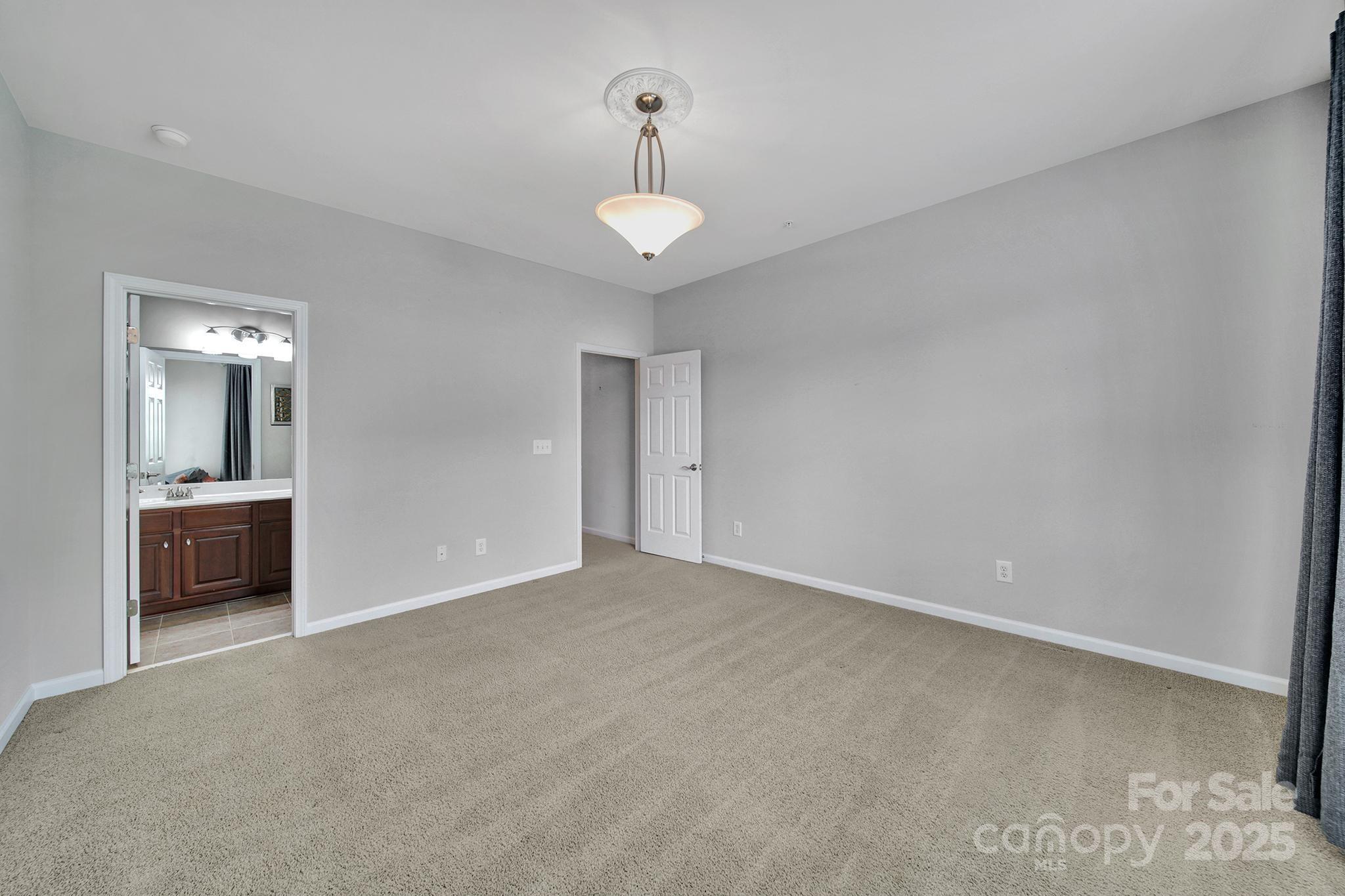 314 Wave Crest Drive Tega Cay, SC 29708 - Photo 27 of 39 a view of an empty room with a window