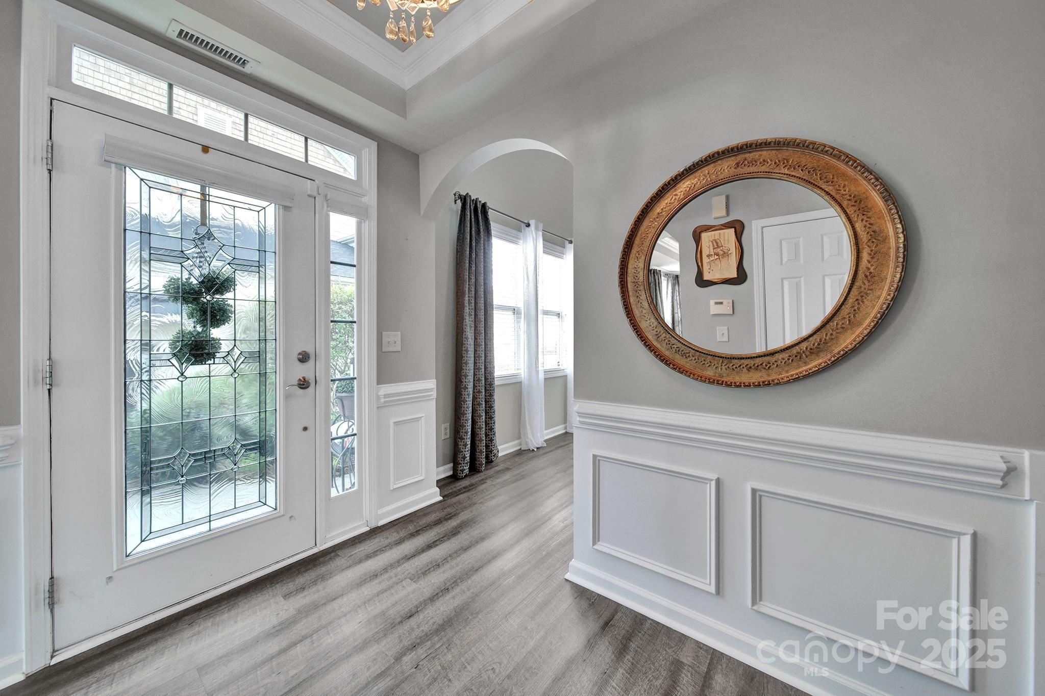 314 Wave Crest Drive Tega Cay, SC 29708 - Photo 3 of 39 a view of a livingroom with furniture and wooden floor