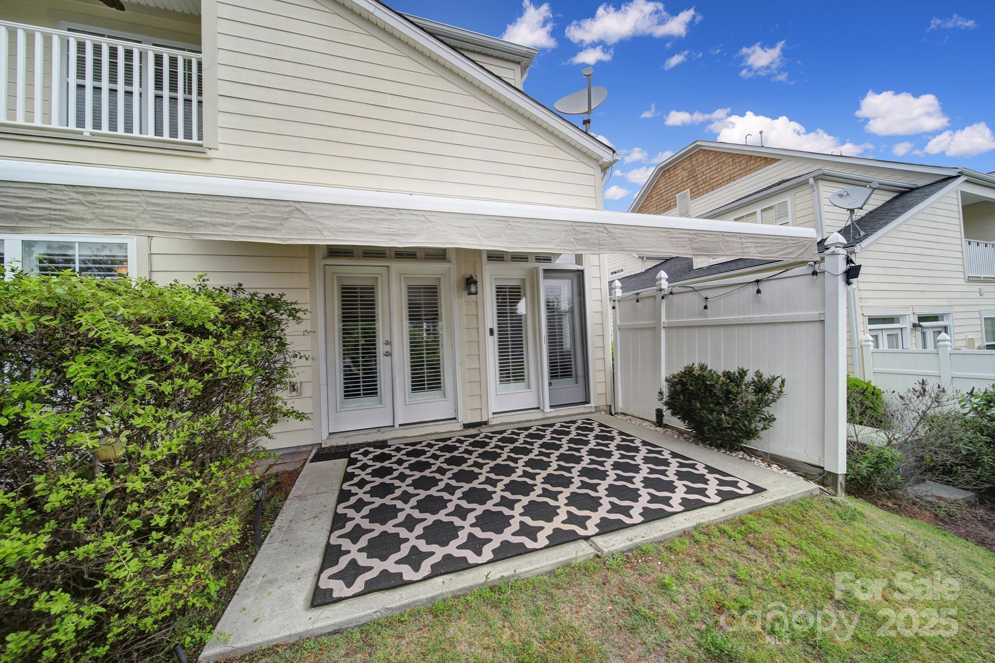 314 Wave Crest Drive Tega Cay, SC 29708 - Photo 31 of 39 a view of a back yard of the house