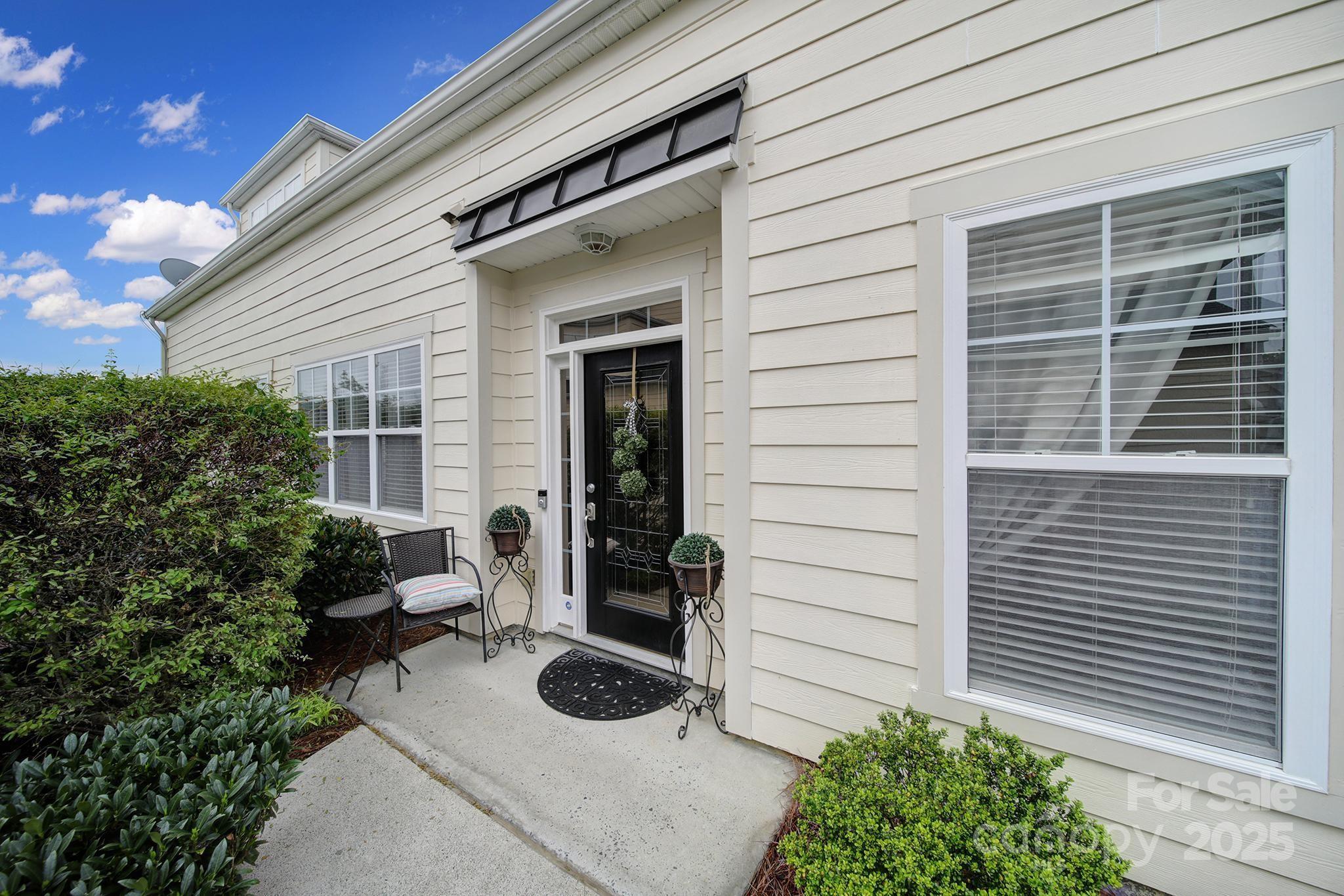 314 Wave Crest Drive Tega Cay, SC 29708 - Photo 35 of 39 a house view with a backyard space