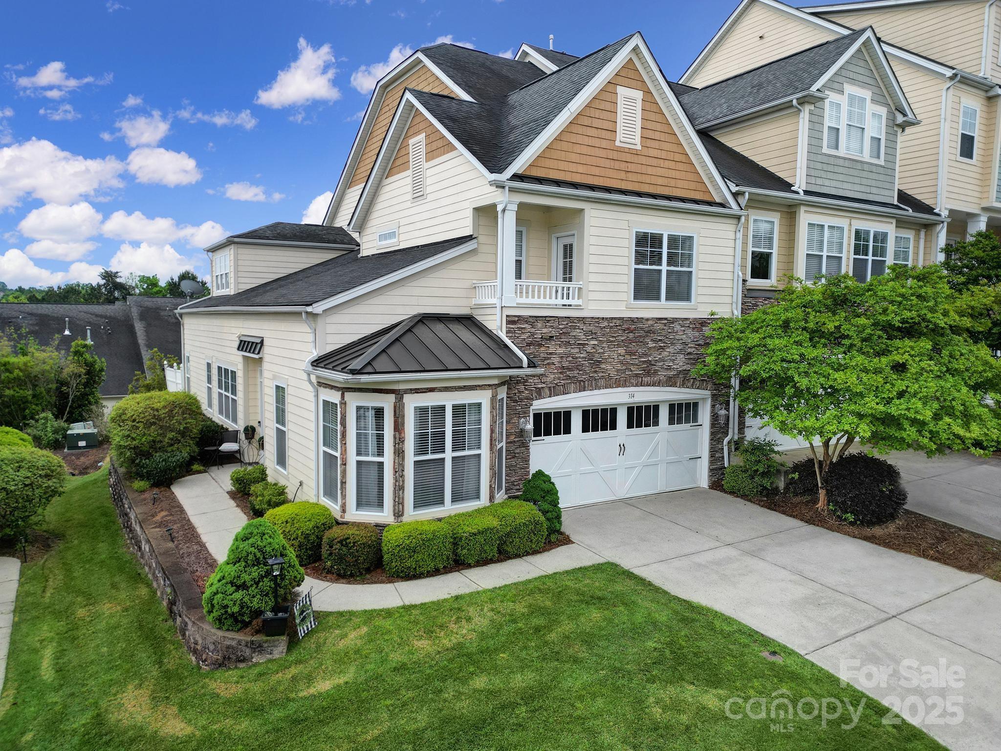 314 Wave Crest Drive Tega Cay, SC 29708 - Photo 37 of 39 front view of a house with a yard