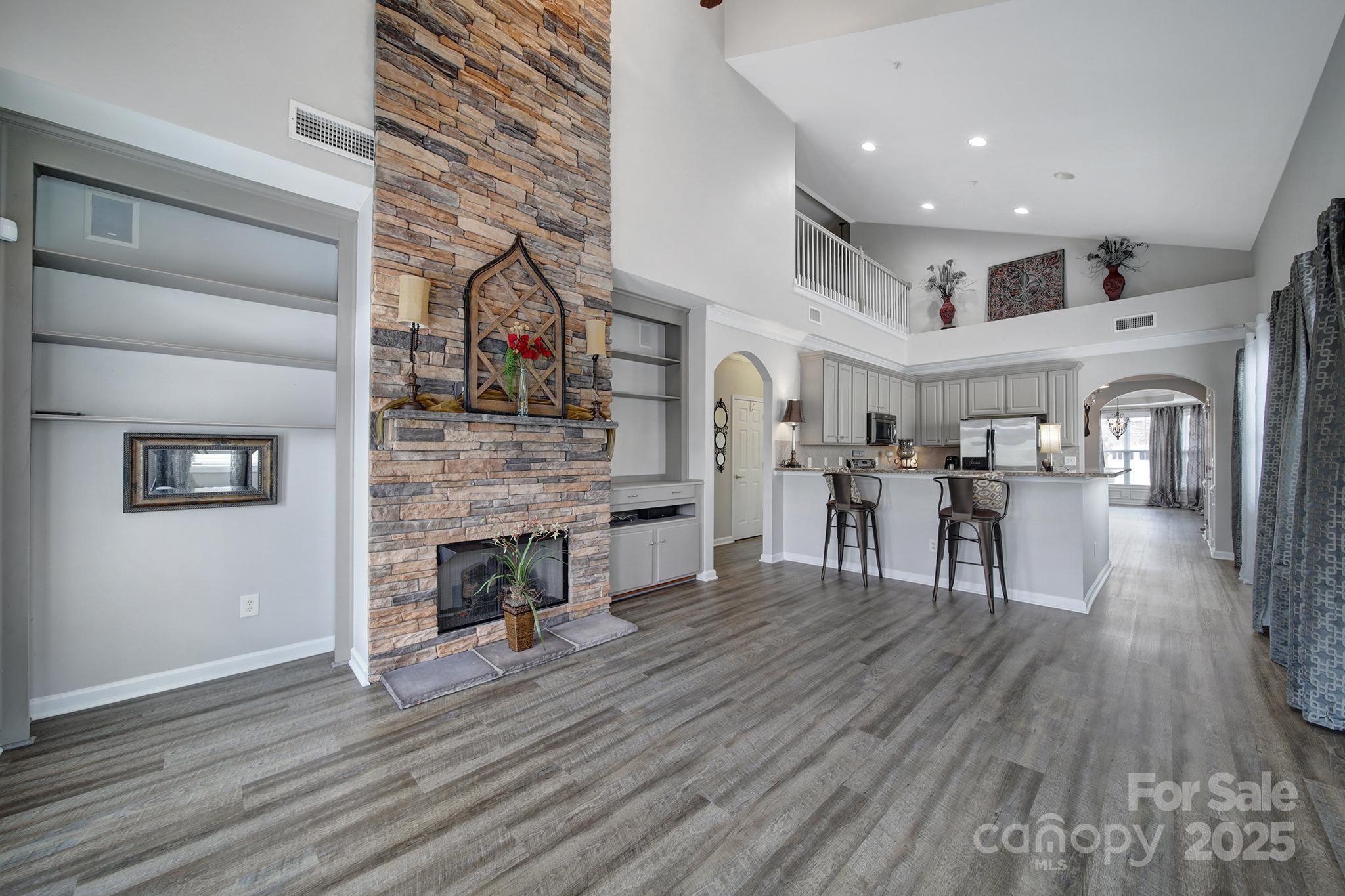 314 Wave Crest Drive Tega Cay, SC 29708 - Photo 10 of 39 a living room with furniture and a fireplace