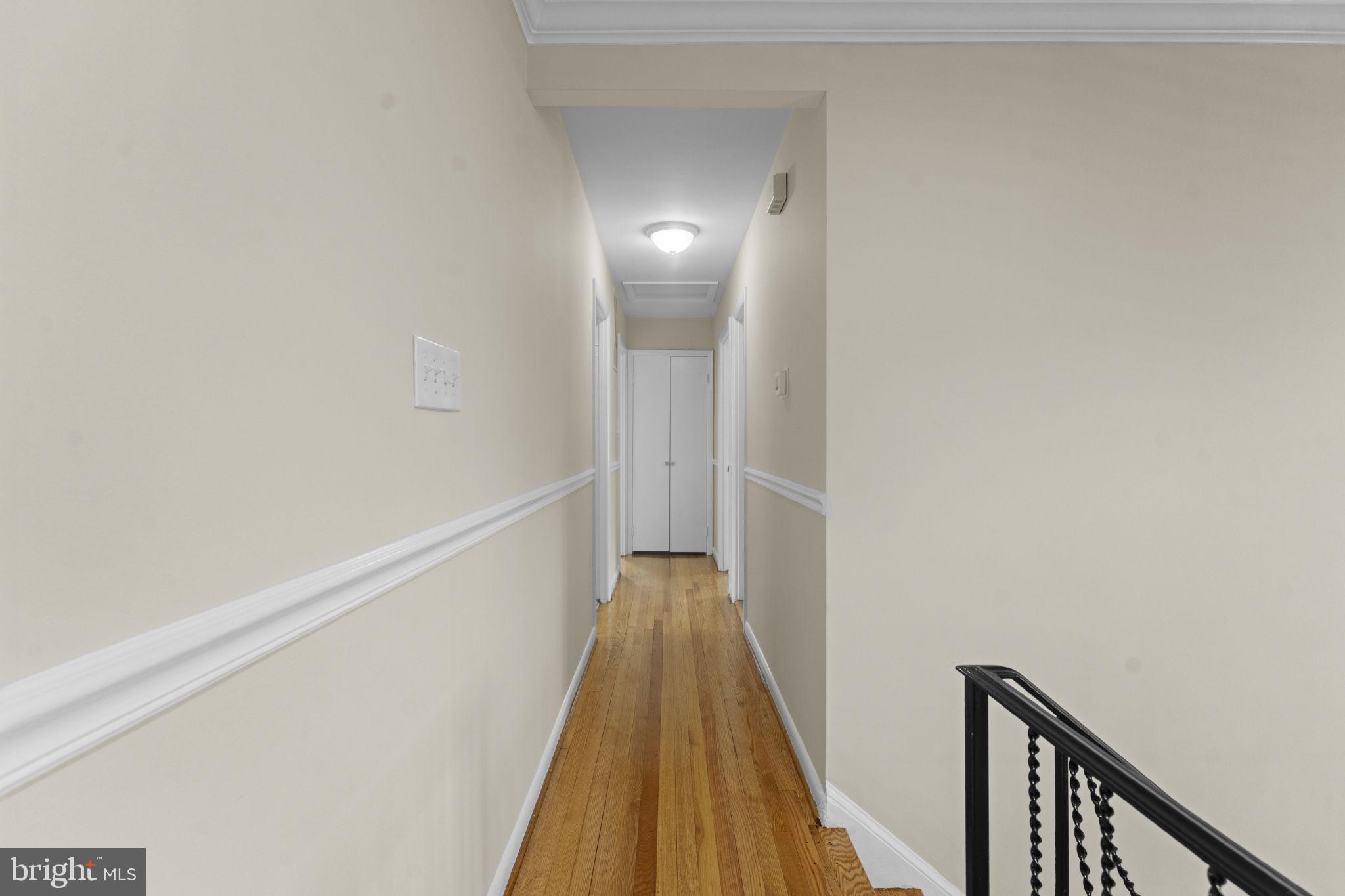 3003 Raymond Court Fort Washington, MD 20744 - Photo 19 of 30 a view of a hallway with wooden floor