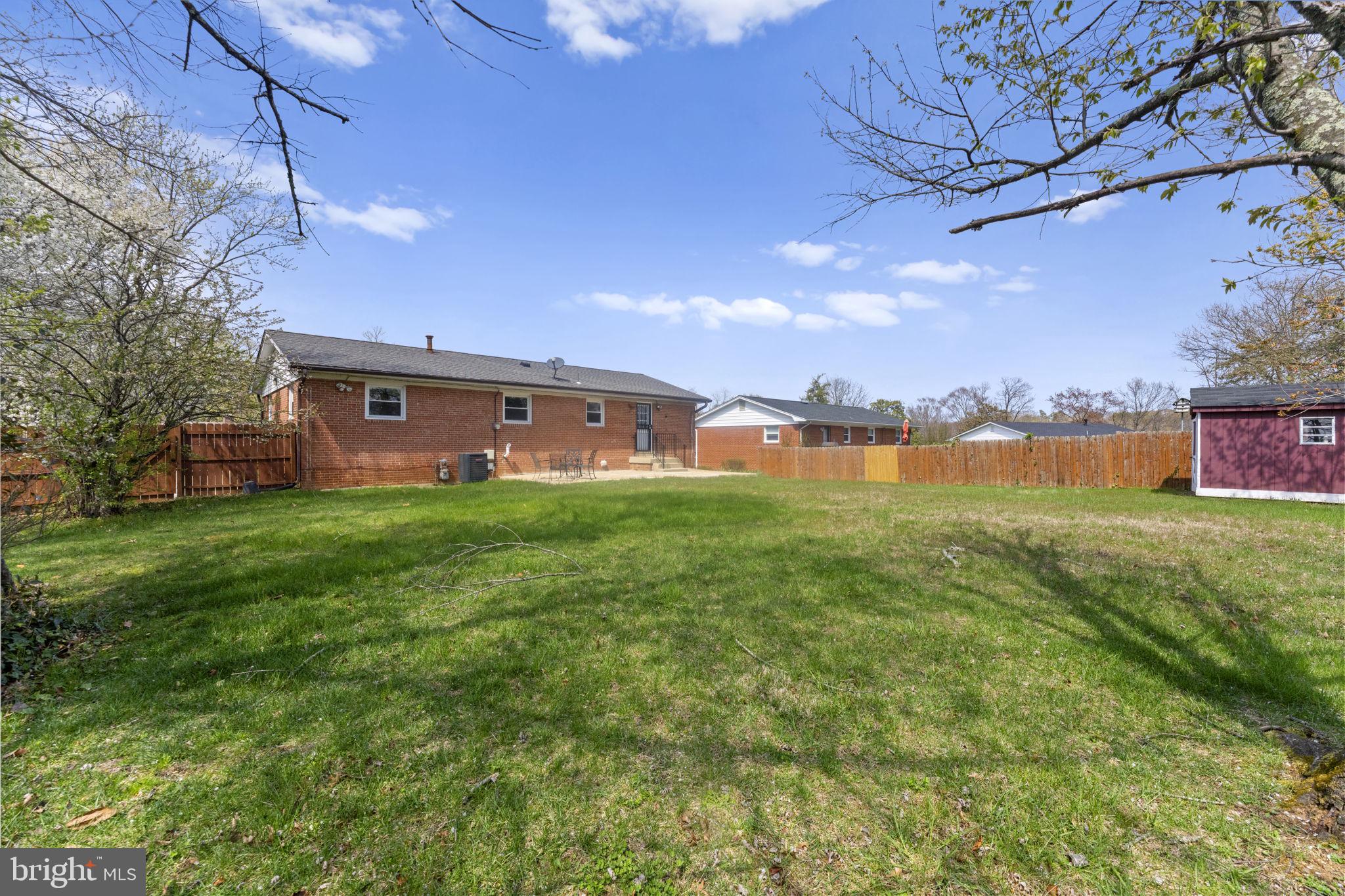 3003 Raymond Court Fort Washington, MD 20744 - Photo 28 of 30 a big yard with table and chairs