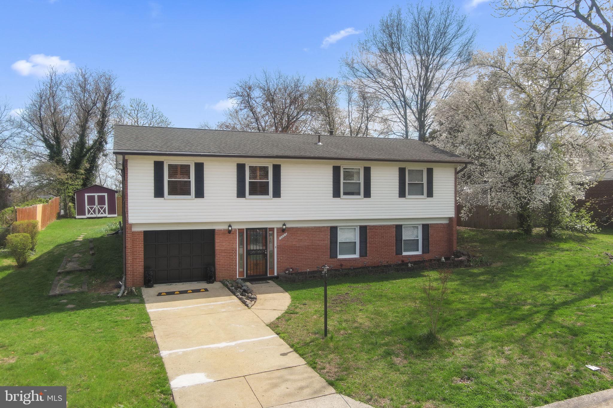 3003 Raymond Court Fort Washington, MD 20744 - Photo 29 of 30 a front view of a house with garden