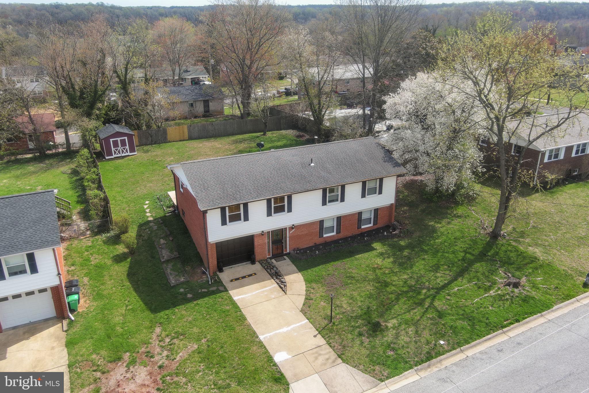 3003 Raymond Court Fort Washington, MD 20744 - Photo 30 of 30 an aerial view of residential houses with yard