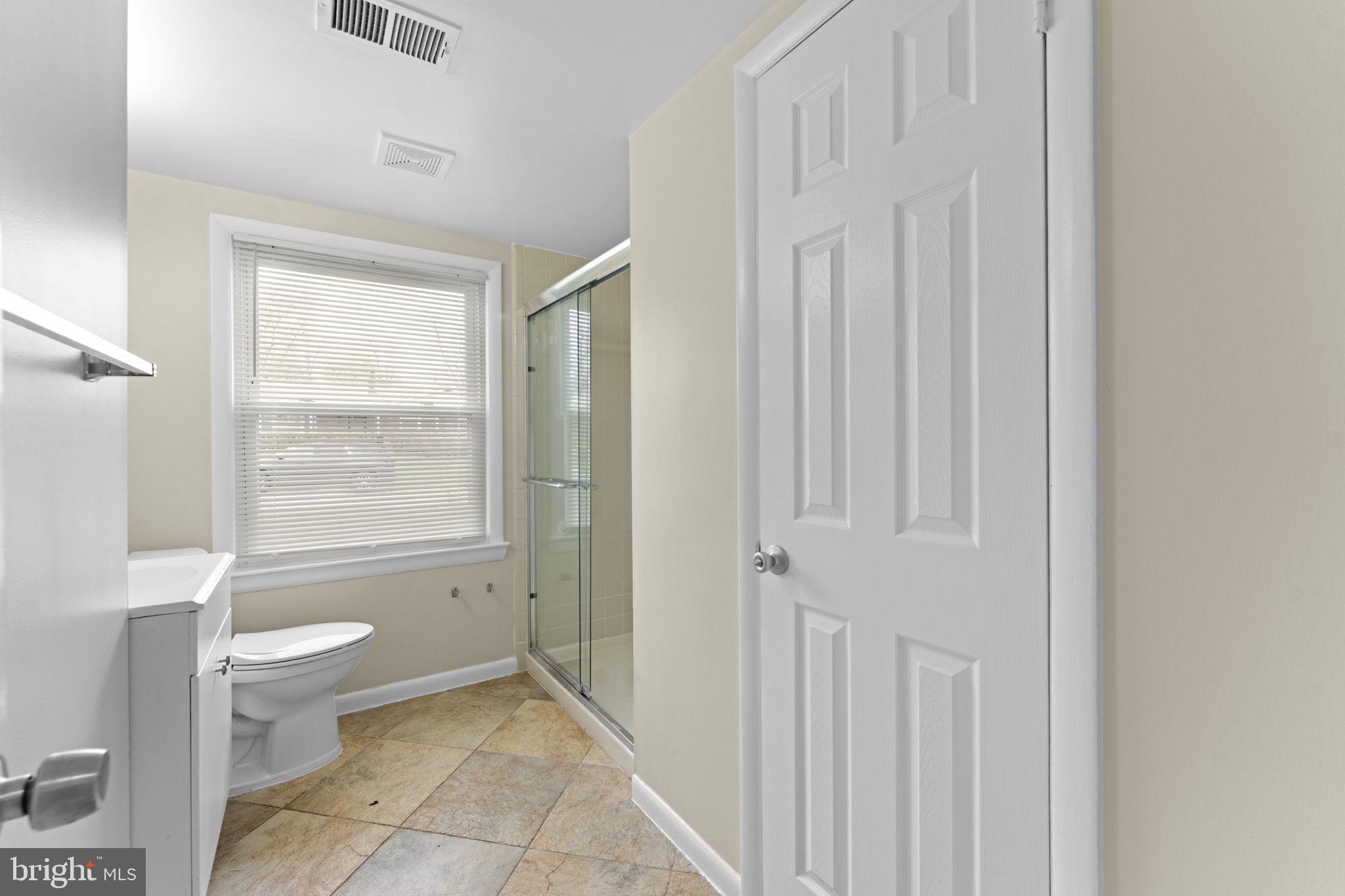 3003 Raymond Court Fort Washington, MD 20744 - Photo 9 of 30 a bathroom with a toilet and a shower