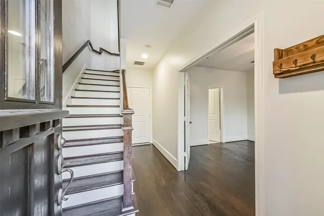 a view of entryway with wooden floor