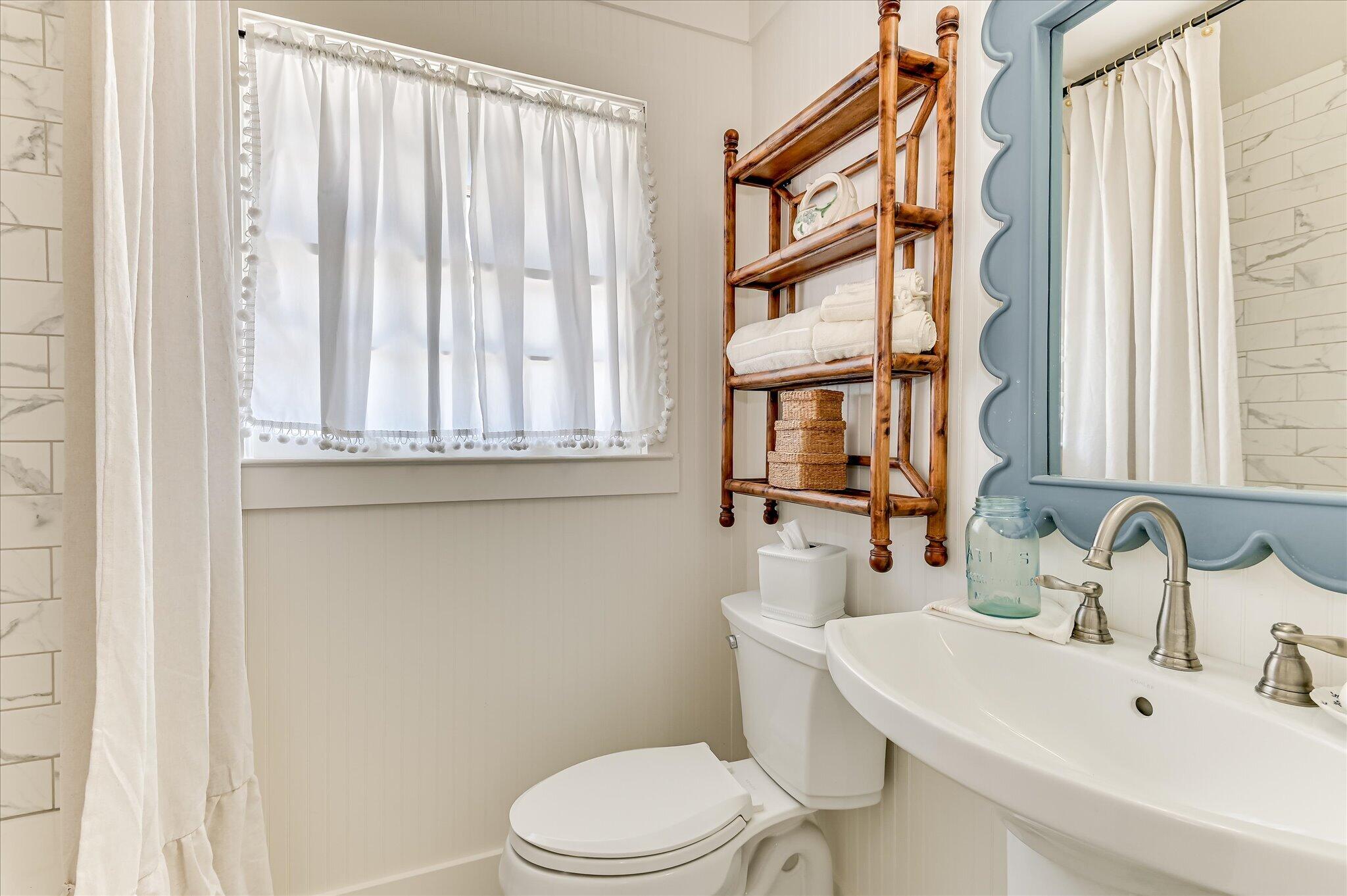 1121 Ridgecrest Avenue North Augusta, SC 29841 - Photo 35 of 42 a bathroom with a sink a toilet and a window
