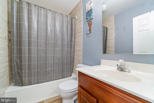 a view of a deck with wooden floor and seating space