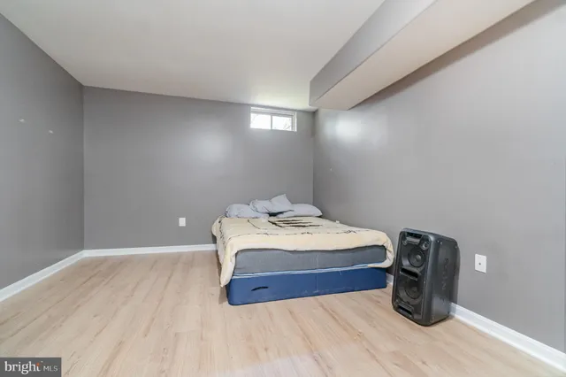 a aerial view of a house with swimming pool garden and patio