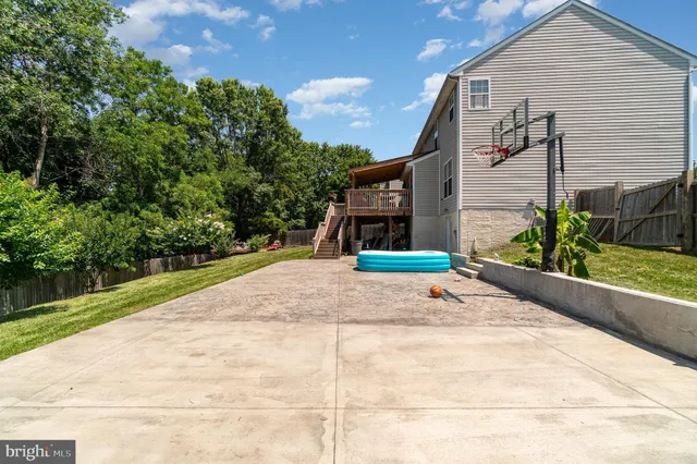 an aerial view of a house with a garden