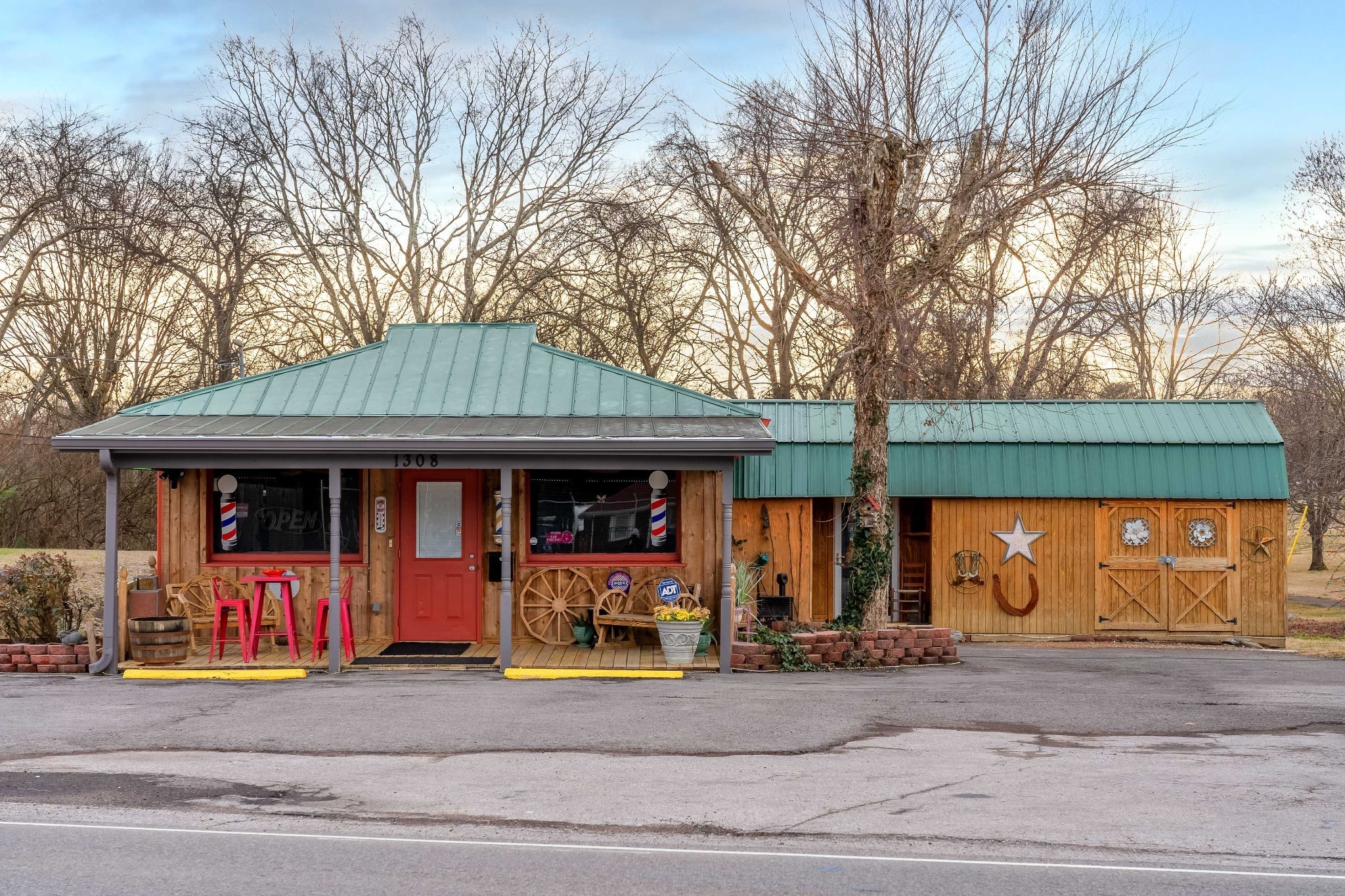 1308 Neelys Bend Road Madison, TN 37115 - Photo 11 of 55 a front view of a house with lots of space and garage