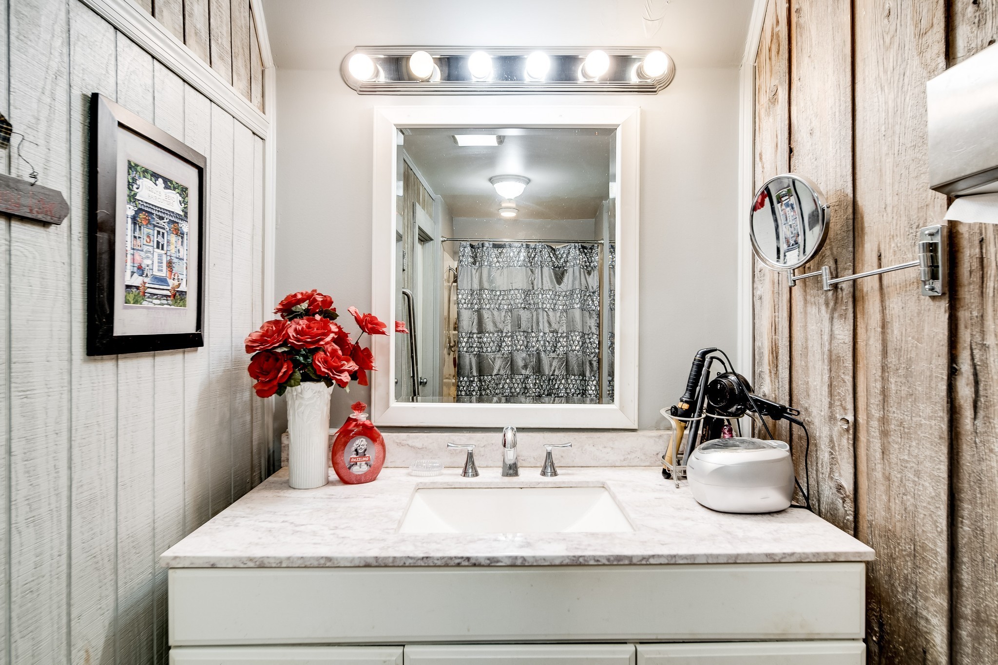 1308 Neelys Bend Road Madison, TN 37115 - Photo 26 of 55 a bathroom with a granite countertop sink and a mirror