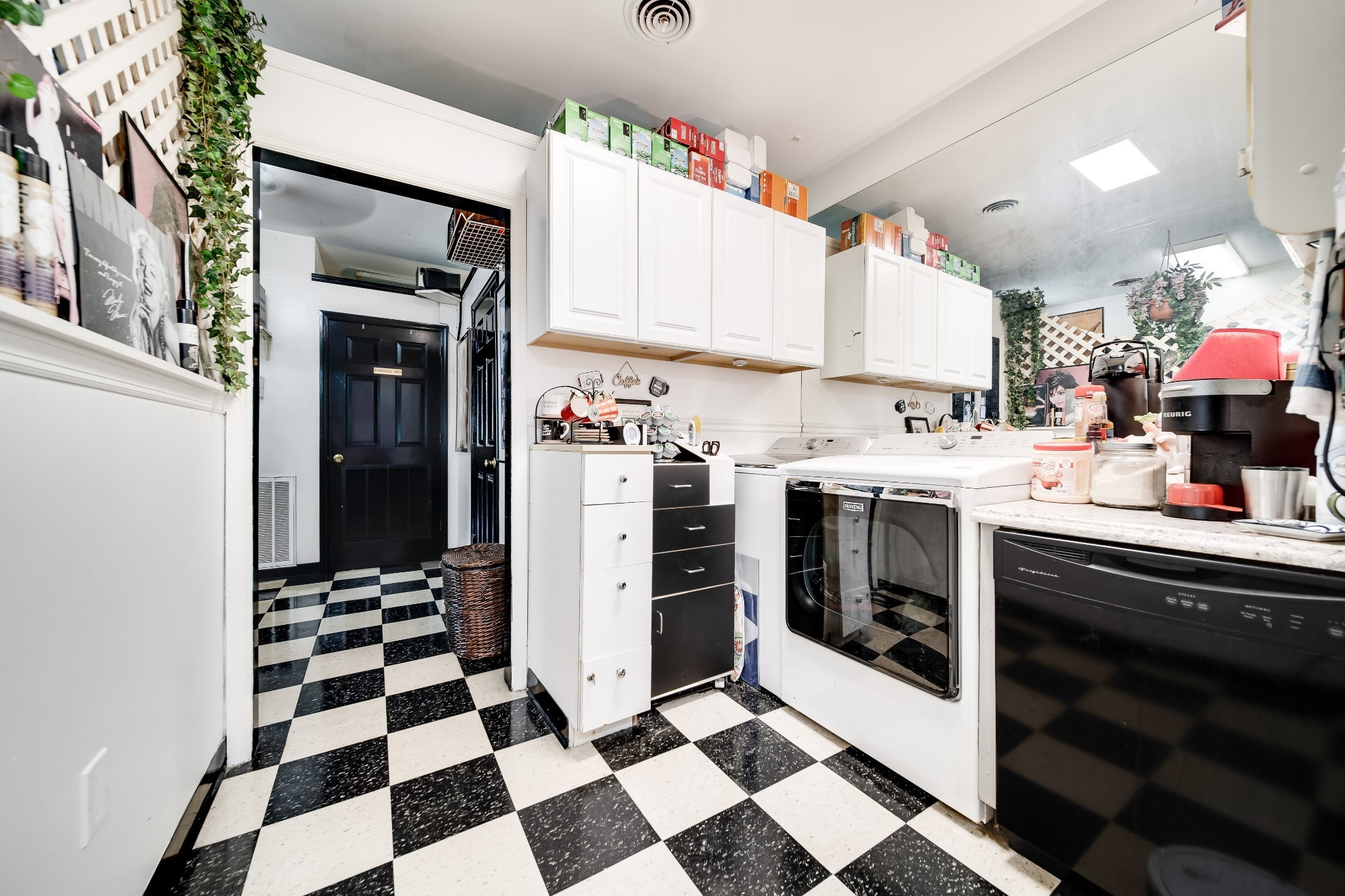 1308 Neelys Bend Road Madison, TN 37115 - Photo 27 of 55 a kitchen with stainless steel appliances and cabinets