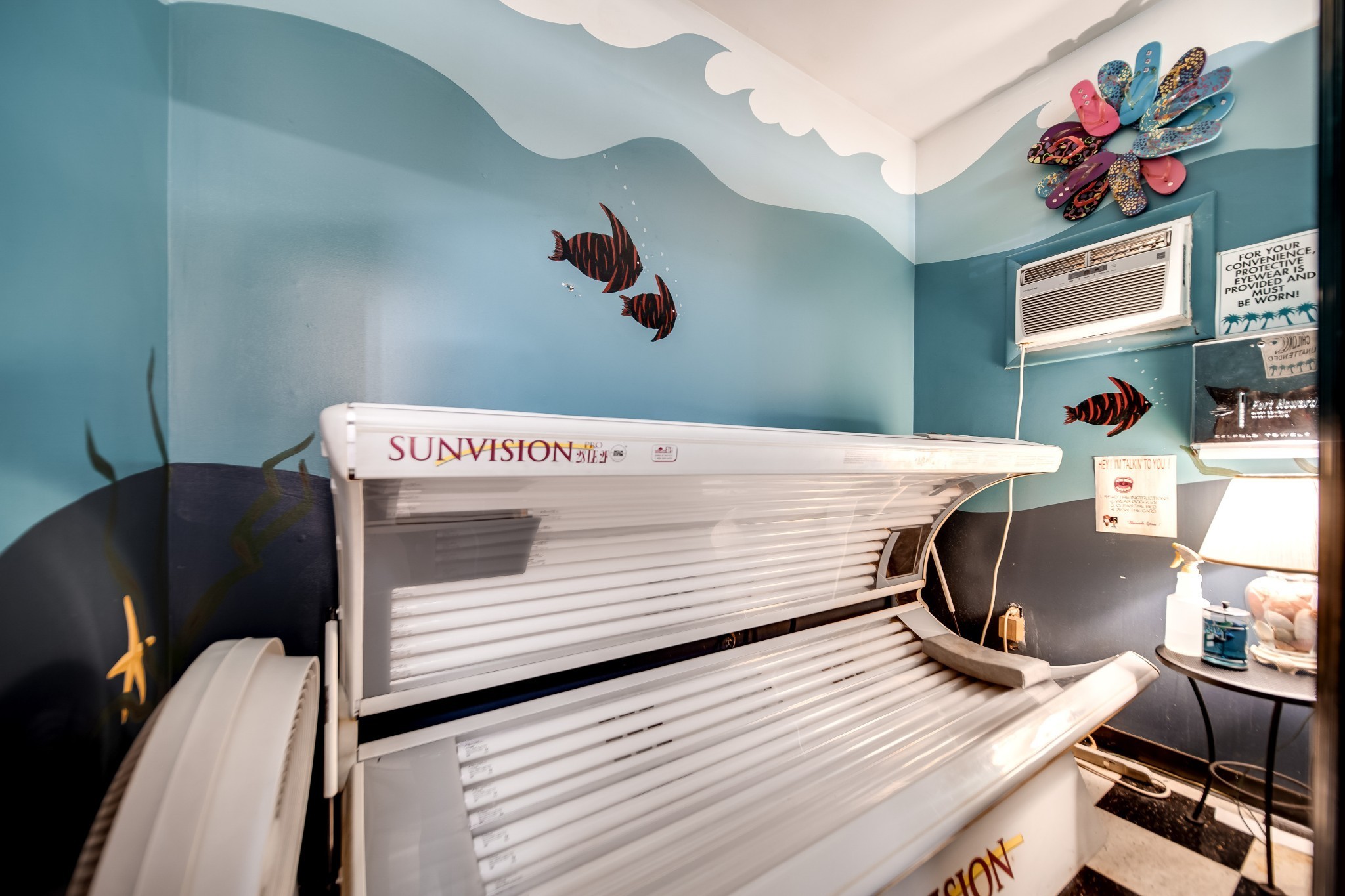 1308 Neelys Bend Road Madison, TN 37115 - Photo 30 of 55 a view of a room with shelves and wooden floor