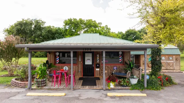 a view of a car park in front of a building