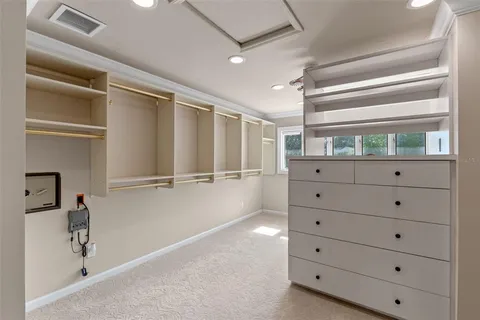 a bathroom with a double vanity sink mirror and