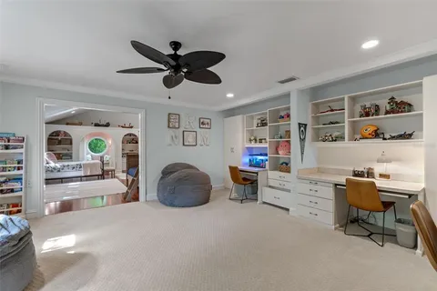 a patio with table and chairs