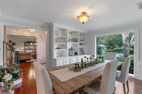 a kitchen with stainless steel appliances granite countertop a sink and a stove