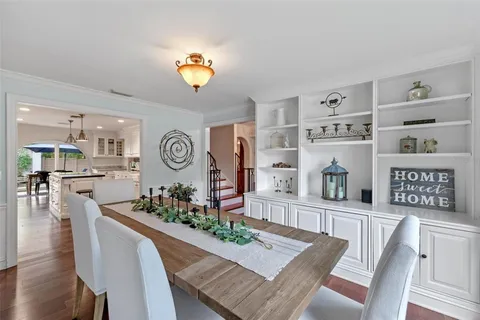 a view of a livingroom with furniture window and wooden floor