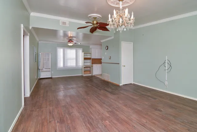 a view of a chandelier in a room and chandelier