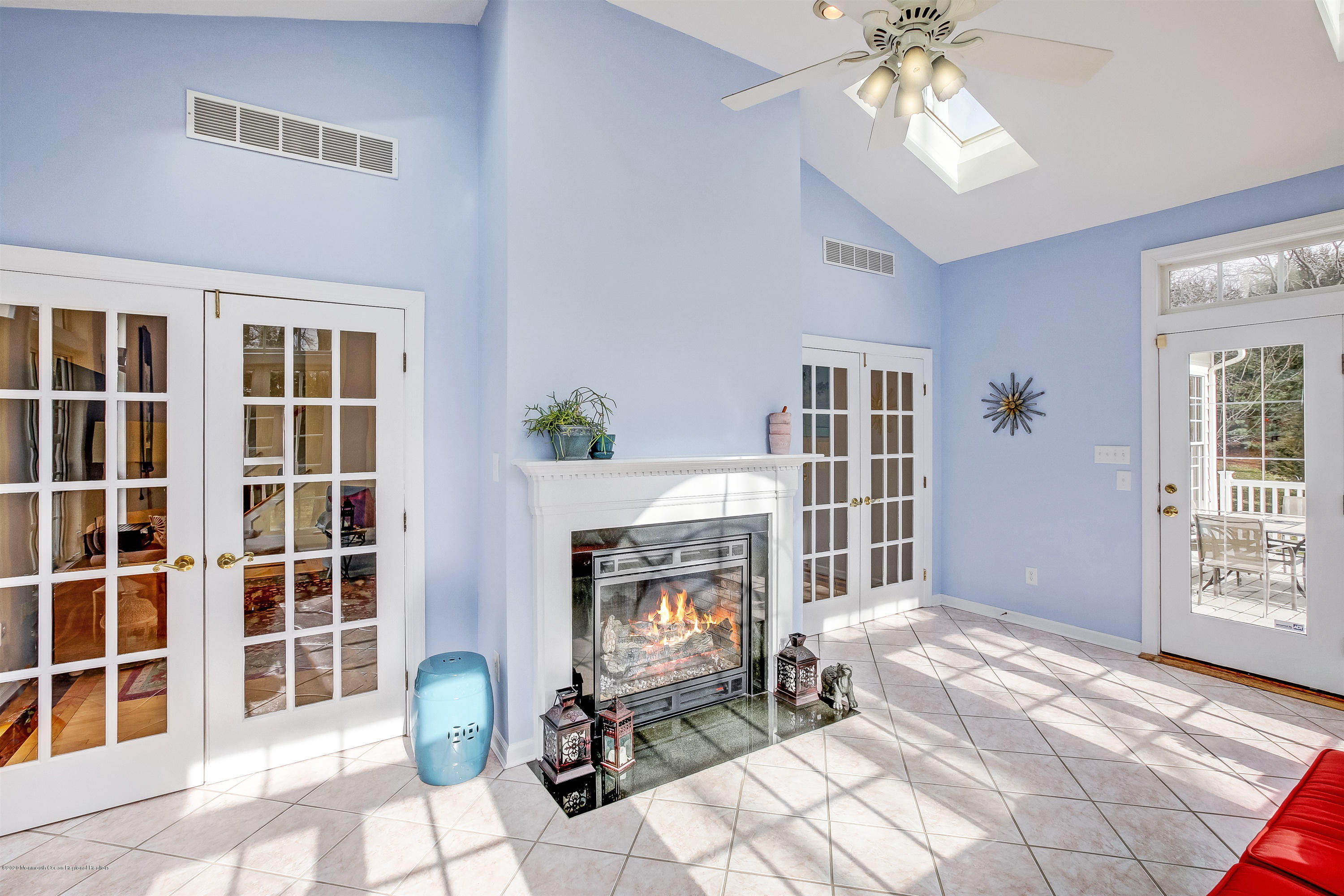 2801 Colonial Drive Wall, NJ 07719 - Photo 17 of 43 a living room with furniture a front door and a fireplace