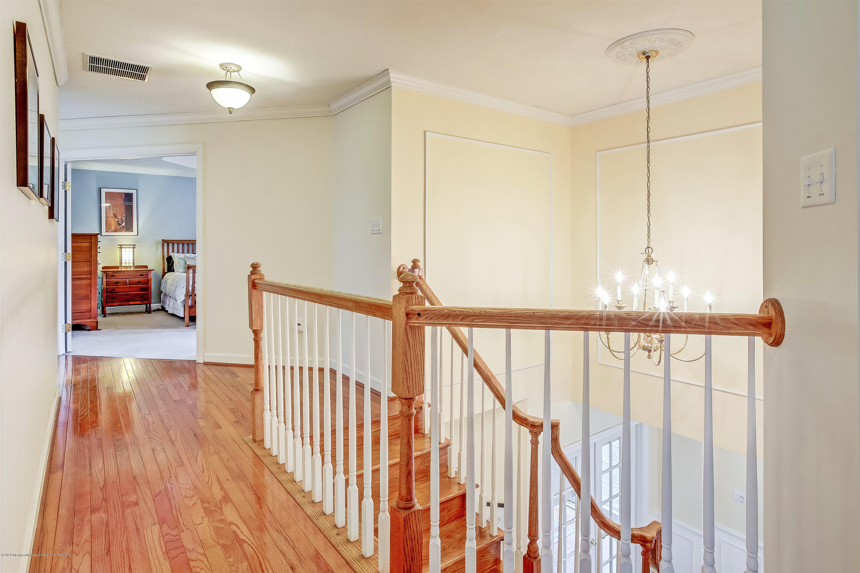 2801 Colonial Drive Wall, NJ 07719 - Photo 20 of 43 a view of hallway with wooden floor