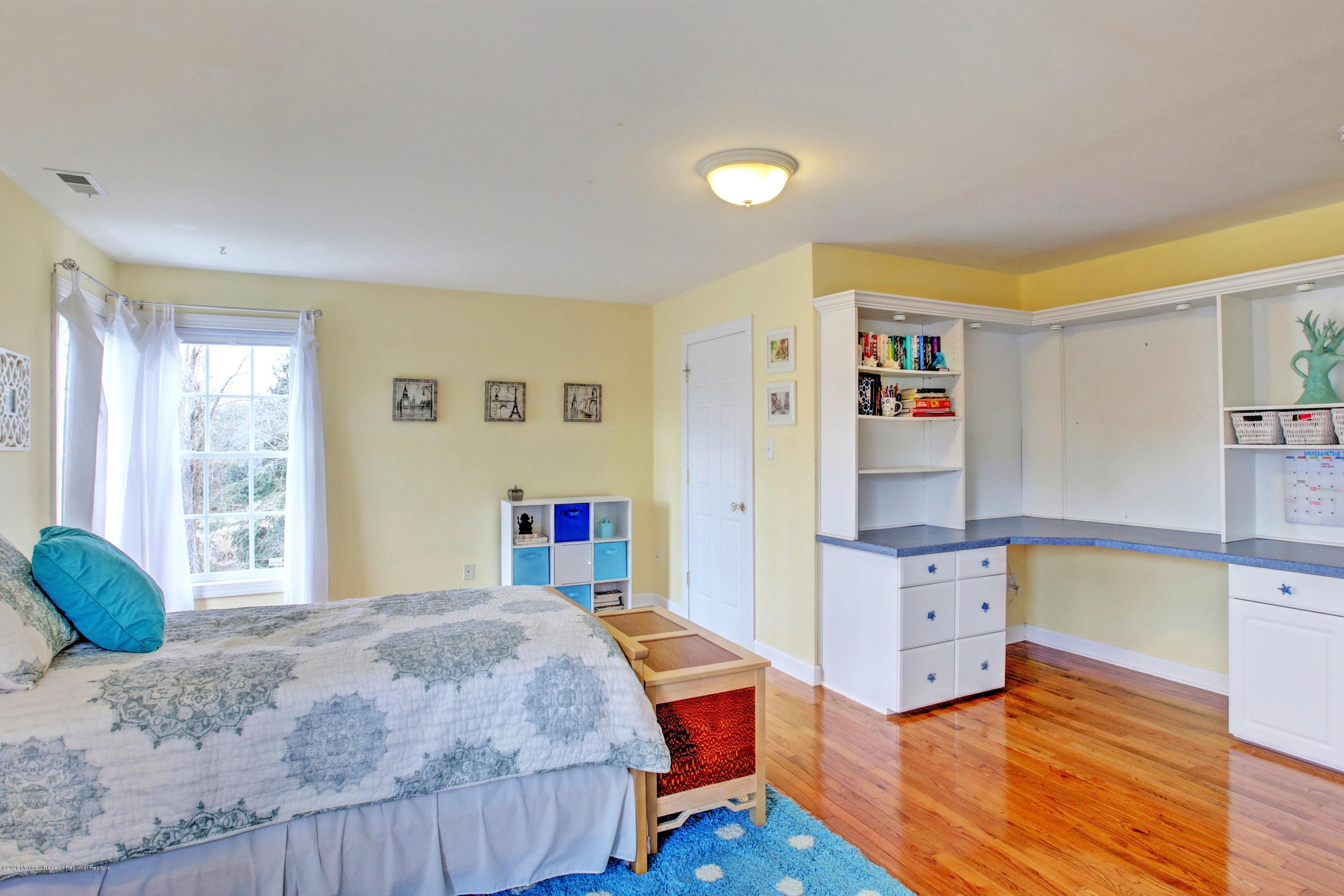 2801 Colonial Drive Wall, NJ 07719 - Photo 30 of 43 a bedroom with a bed and a dresser in it