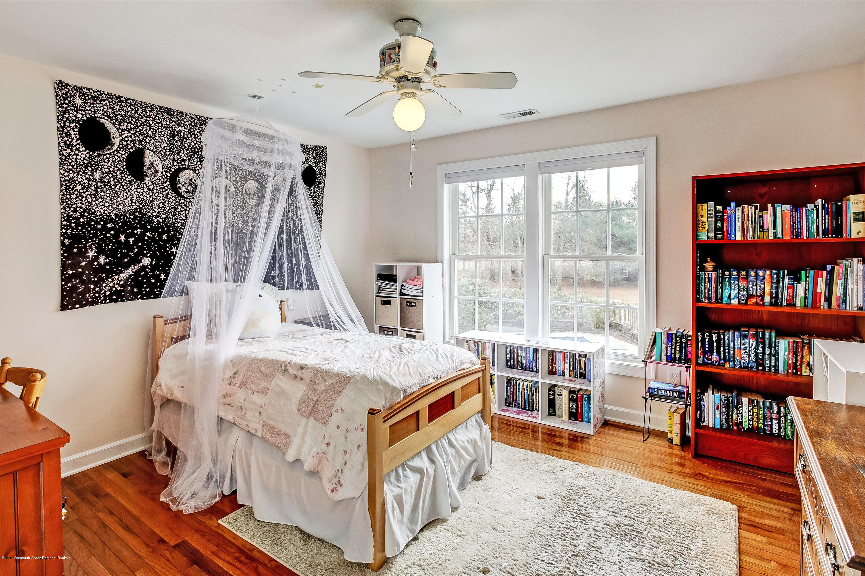 2801 Colonial Drive Wall, NJ 07719 - Photo 31 of 43 a room with furniture and a book shelf
