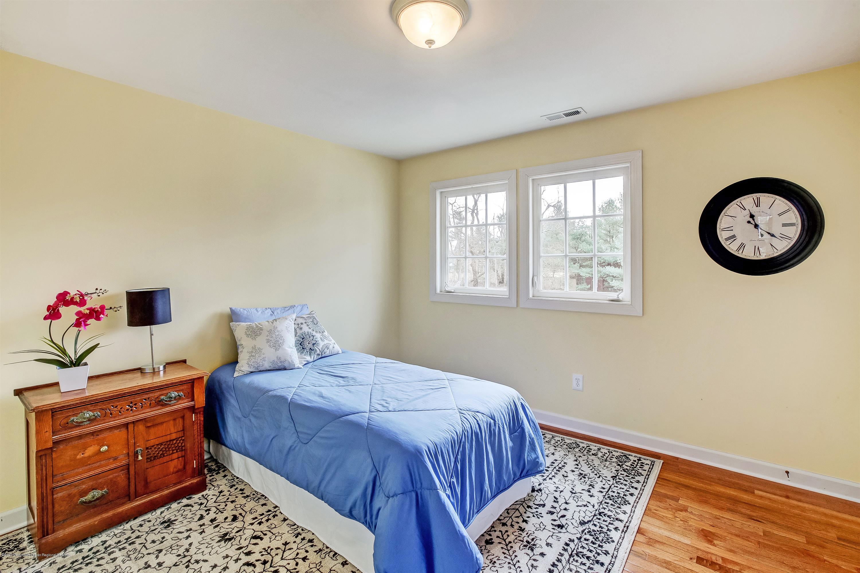 2801 Colonial Drive Wall, NJ 07719 - Photo 32 of 43 a bedroom with a bed and a window
