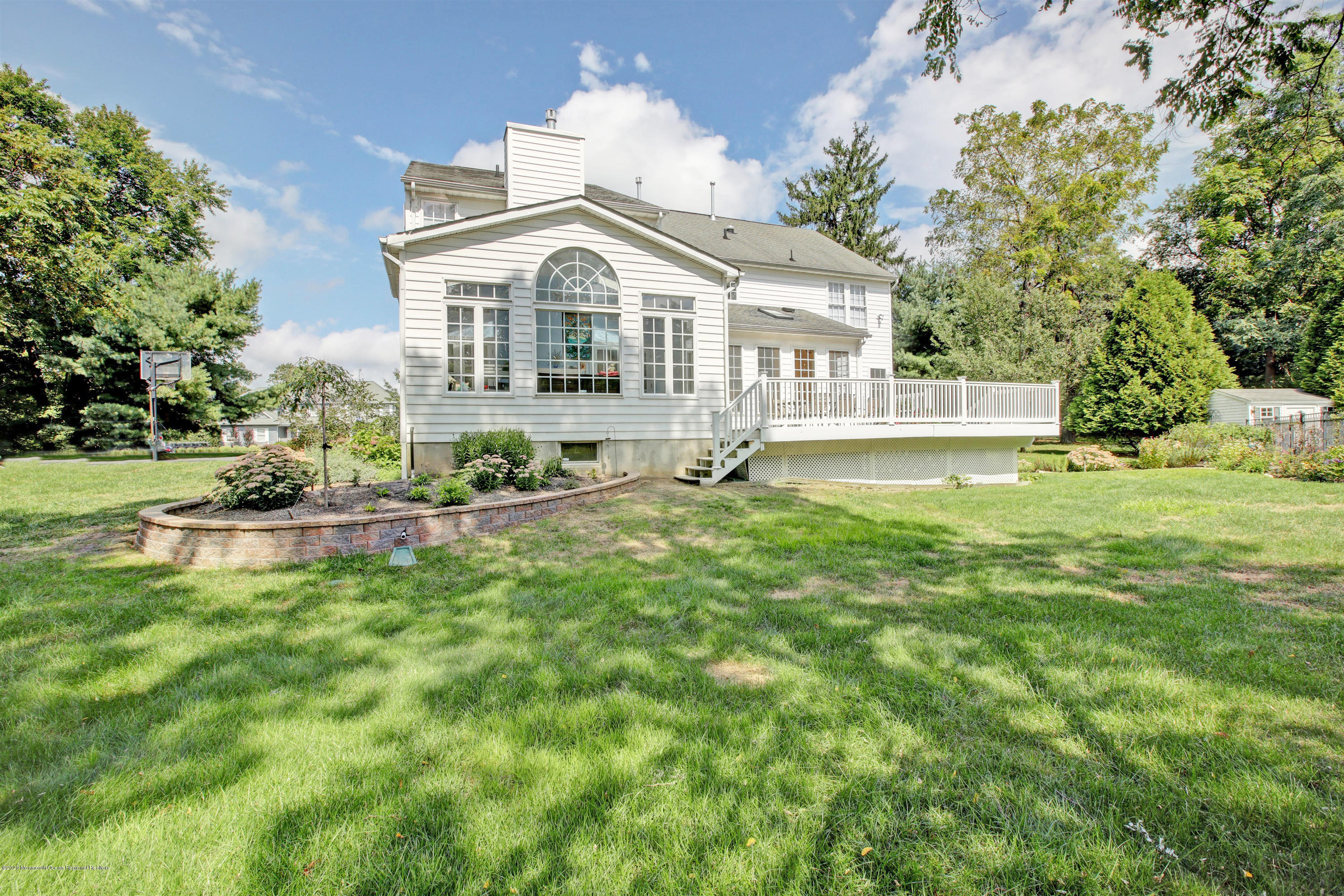 2801 Colonial Drive Wall, NJ 07719 - Photo 40 of 43 a front view of a house with a yard