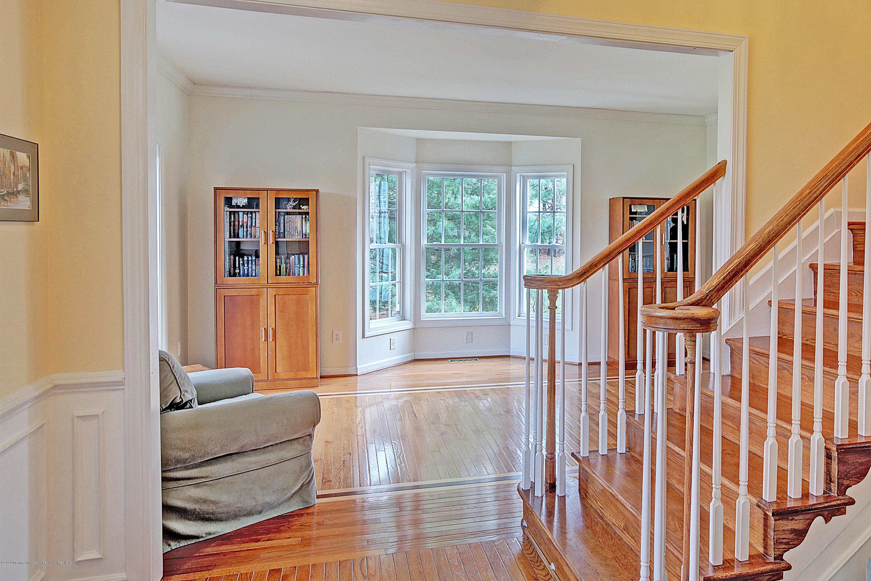 2801 Colonial Drive Wall, NJ 07719 - Photo 4 of 43 a hallway with windows and stairs