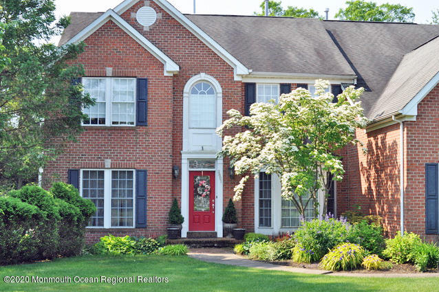 2801 Colonial Drive Wall, NJ 07719 - Photo 43 of 43 front view of a house with a yard