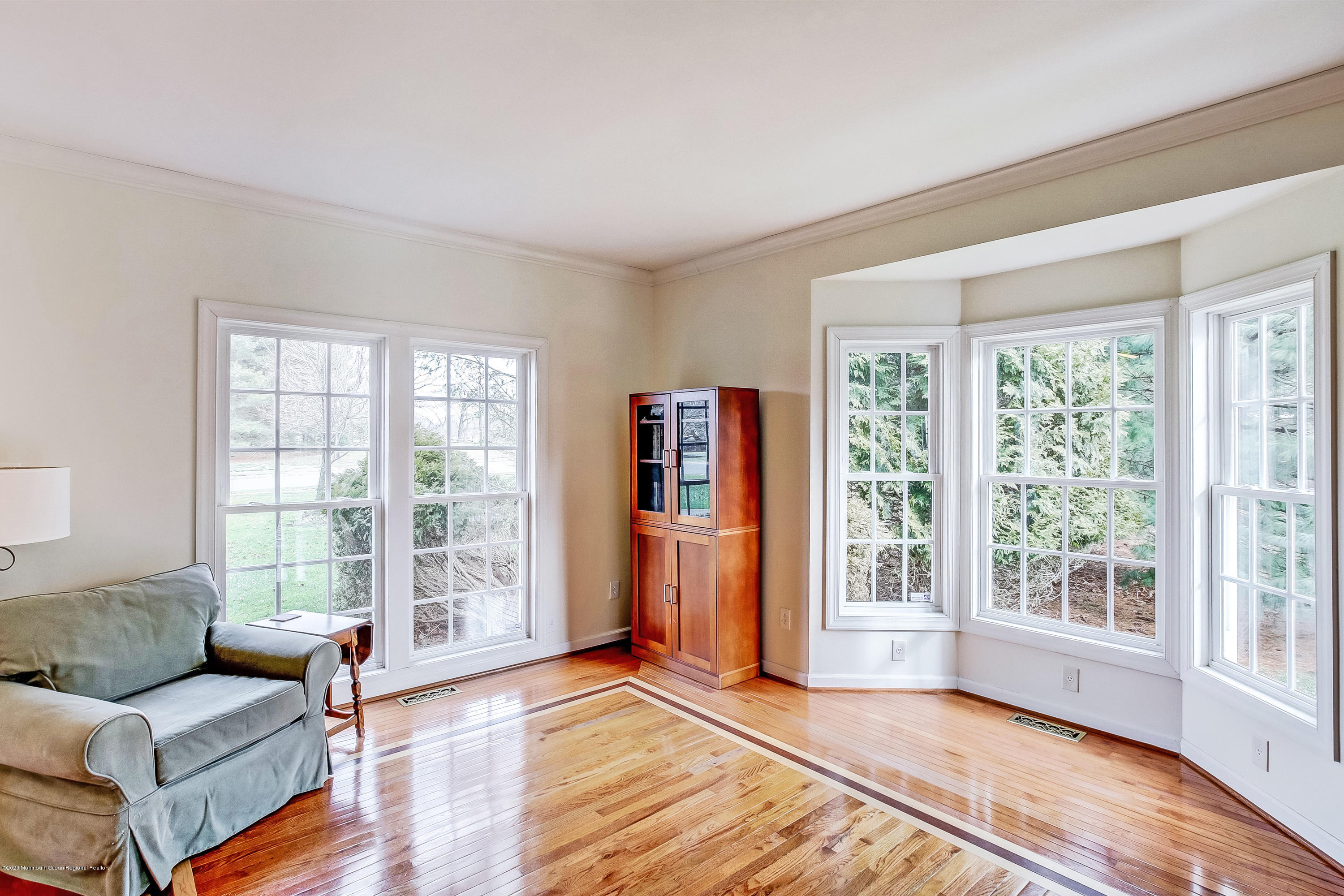 2801 Colonial Drive Wall, NJ 07719 - Photo 5 of 43 a view of a livingroom with furniture and wooden floor