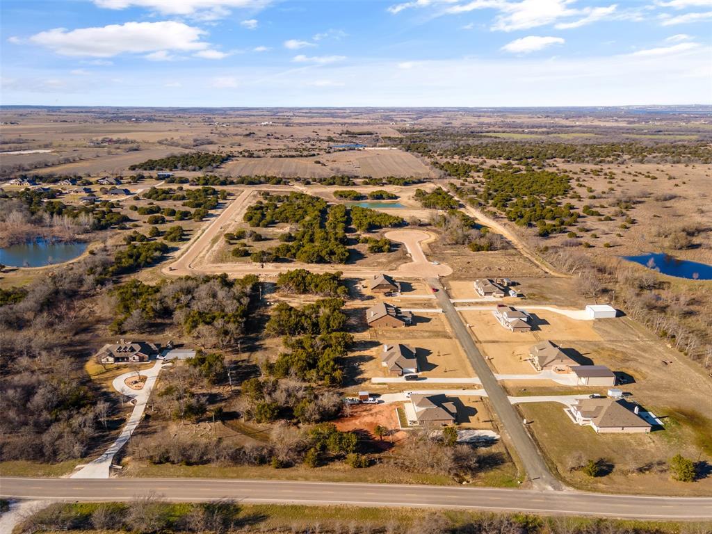 7705 Emersyn Drive Rio Vista, TX 76093 - Photo 3 of 6 an aerial view of multiple house