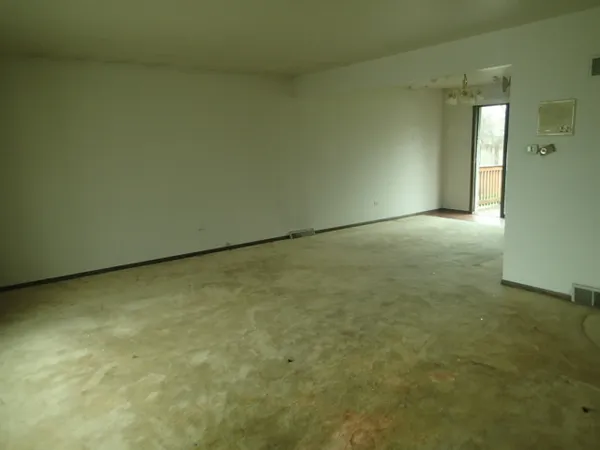 an empty room with a natural light