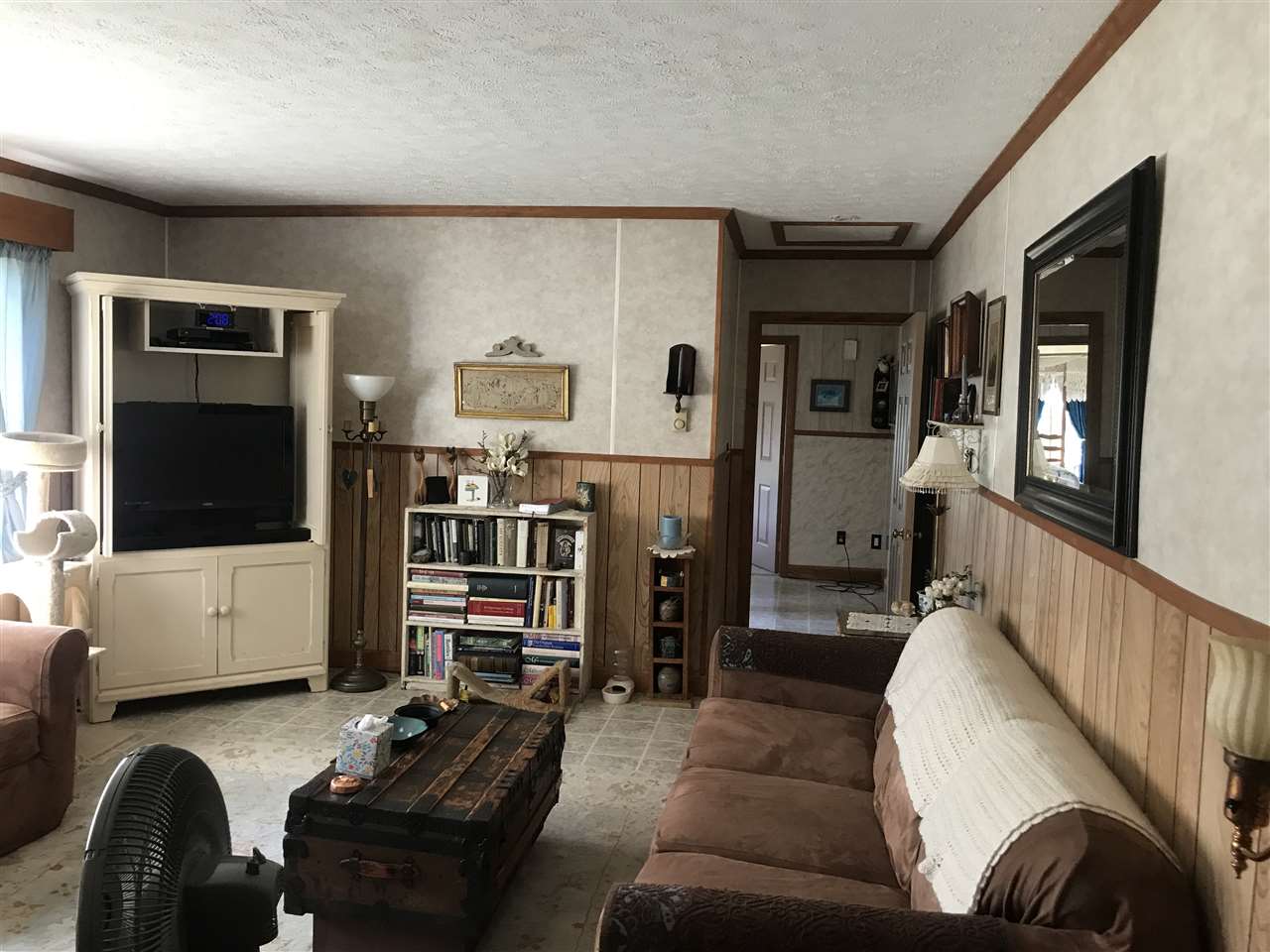 7 Coffman Road Weyers Cave, VA 24486 - Photo 8 of 23 a living room with furniture and a flat screen tv