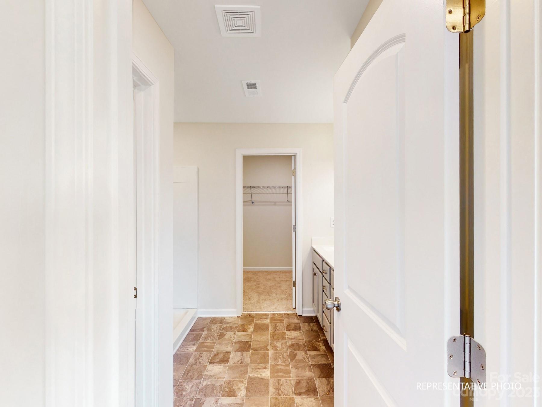 5028 Raspberry Knoll Drive, Unit 1 Charlotte, NC 28208 - Photo 9 of 16 a view of hallway with stairs
