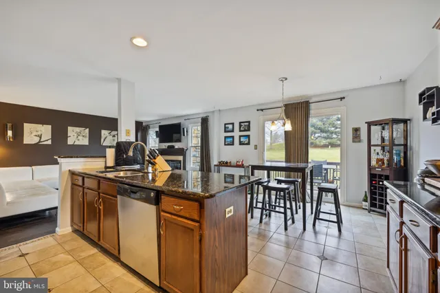 a view of a kitchen and dining room
