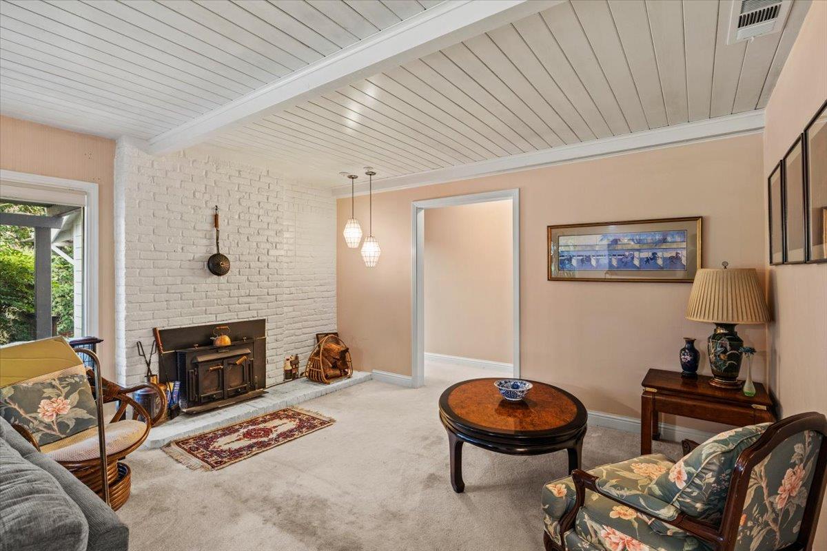 3710 Orchard Lane Sacramento, CA 95821 - Photo 35 of 77 sitting area----gather round the fireplace/wood stove