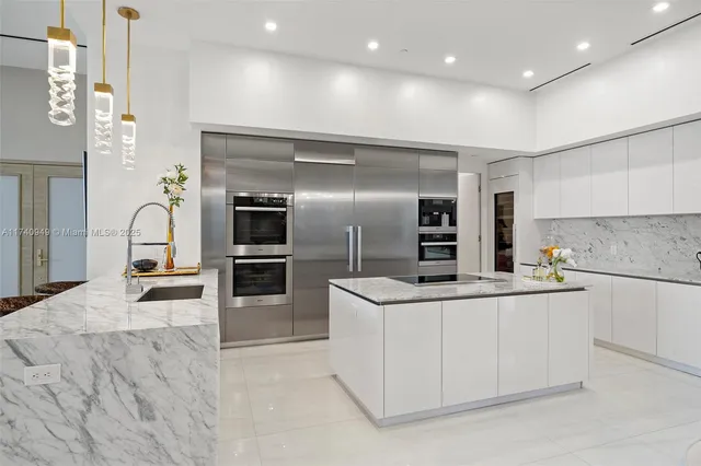 a bedroom with a large bed and a large window