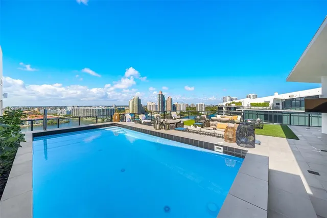 a spacious bedroom with a bed and a large window