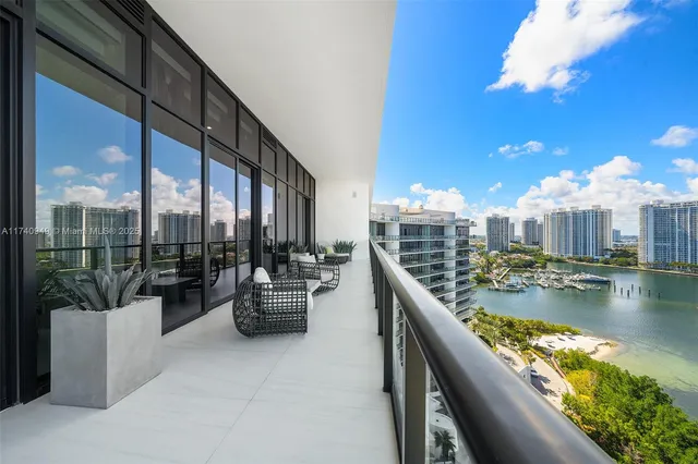 a living room with furniture large window and flat screen