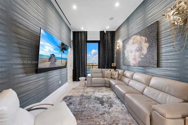 a view of swimming pool with outdoor seating