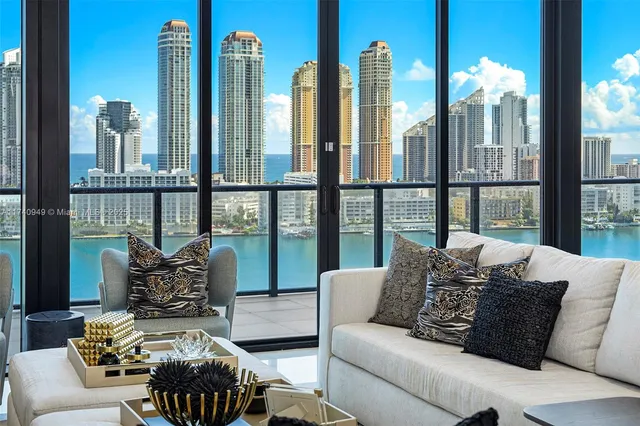 a view of a hallway with wooden floor and closet