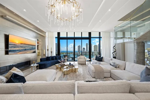 a large kitchen with a table and chairs