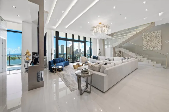 a view of a dining room with furniture and window