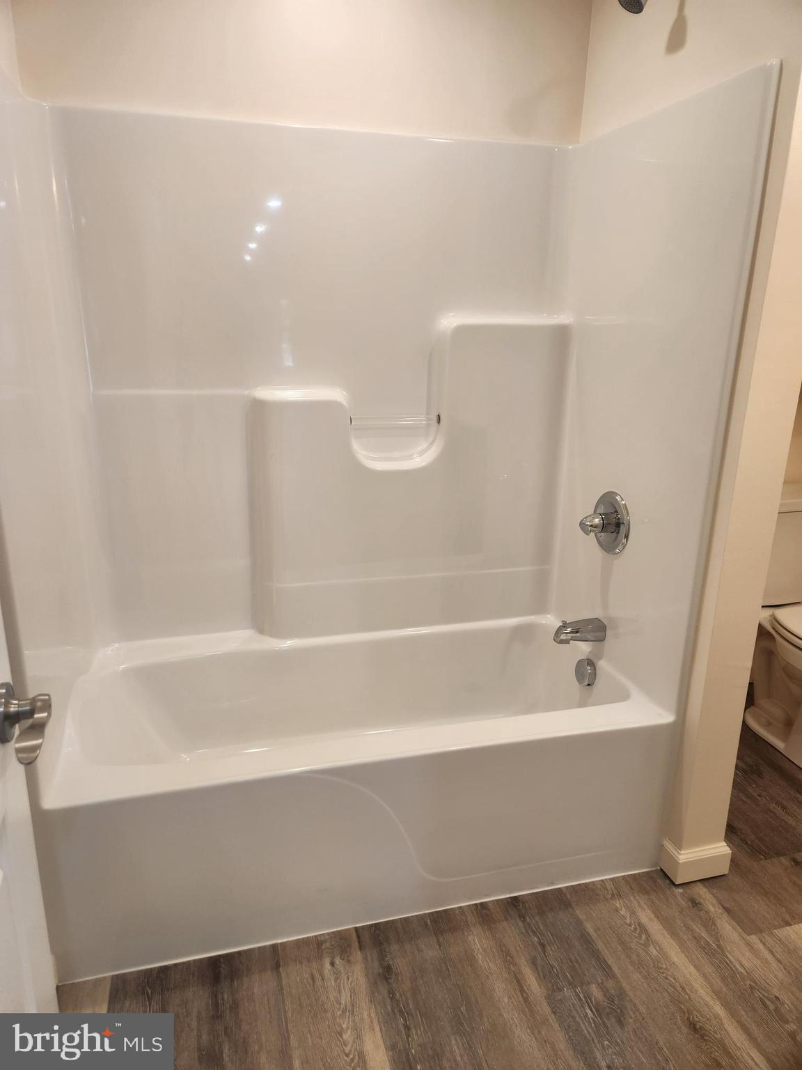 65 Woods Edge Road, Unit 18 Fort Ashby, WV 26719 - Photo 11 of 12 a bathroom with a bathtub